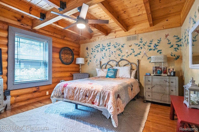 2757 S Hacker Rd, Brighton, MI 48114 - bedroom featuring a wooden ceiling with exposed beams, rustic walls, and wood finished floors