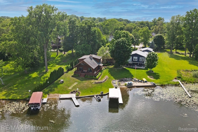 2757 S Hacker Rd, Brighton, MI 48114 - aerial view of property and surrounding area with a nearby body of water