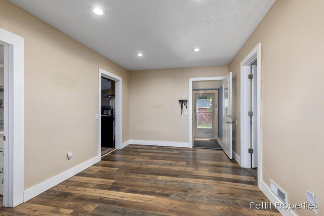 340 E Main St SE, Caledonia, MI 49316 - corridor with recessed lighting and dark wood finished floors