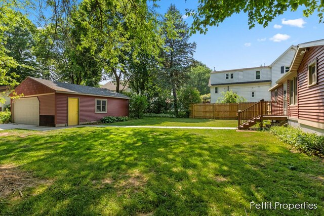 340 E Main St SE, Caledonia, MI 49316 - view of yard with a garage and an outdoor structure