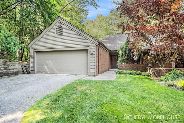 6555 Waybridge Dr SE, Grand Rapids, MI 49546 - single story home featuring asphalt driveway, a garage, brick siding, and a front lawn