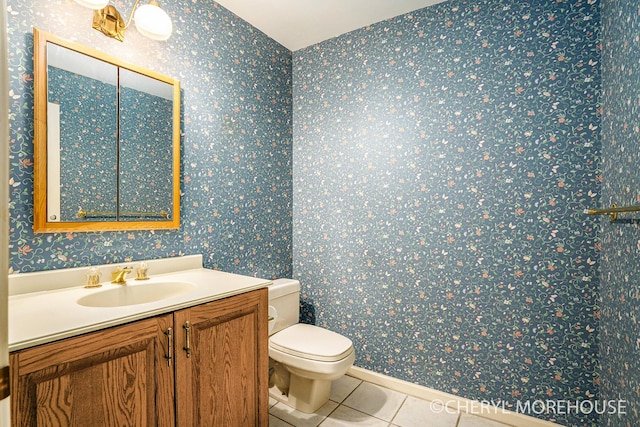 6555 Waybridge Dr SE, Grand Rapids, MI 49546 - bathroom featuring tile patterned floors, vanity, and wallpapered walls