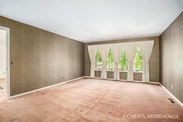 6555 Waybridge Dr SE, Grand Rapids, MI 49546 - carpeted spare room with baseboards