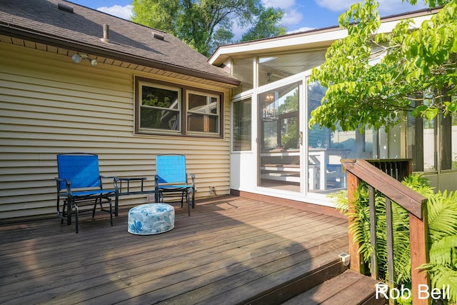 3897 Obrien St SW, Grand Rapids, MI 49534 - wooden deck featuring a sunroom