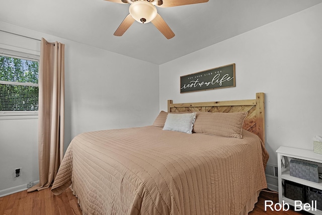 3897 Obrien St SW, Grand Rapids, MI 49534 - bedroom featuring wood finished floors and a ceiling fan