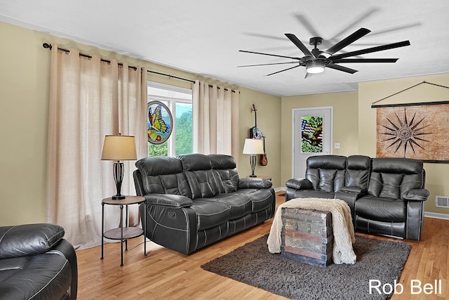 3897 Obrien St SW, Grand Rapids, MI 49534 - living area featuring healthy amount of natural light, a ceiling fan, and wood finished floors