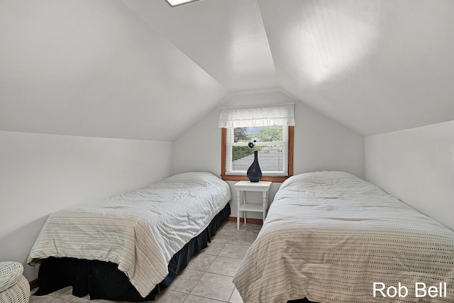 3897 Obrien St SW, Grand Rapids, MI 49534 - bedroom featuring lofted ceiling and light tile patterned floors