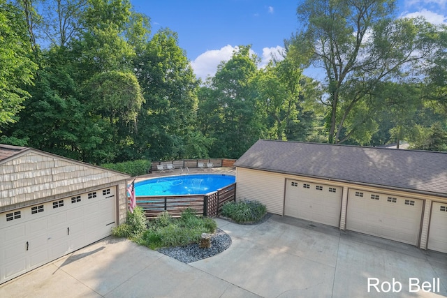 3897 Obrien St SW, Grand Rapids, MI 49534 - garage featuring an outdoor pool
