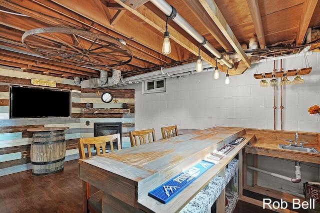 3897 Obrien St SW, Grand Rapids, MI 49534 - dining area featuring wood finished floors and a glass covered fireplace