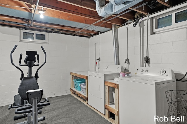 3897 Obrien St SW, Grand Rapids, MI 49534 - laundry room with washing machine and clothes dryer and concrete block wall
