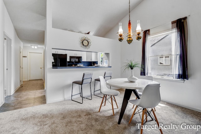 271 Rolling Greene Dr NW, Grand Rapids, MI 49534 - dining area featuring a chandelier, light carpet, and high vaulted ceiling