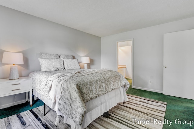 271 Rolling Greene Dr NW, Grand Rapids, MI 49534 - bedroom with dark carpet and ensuite bath