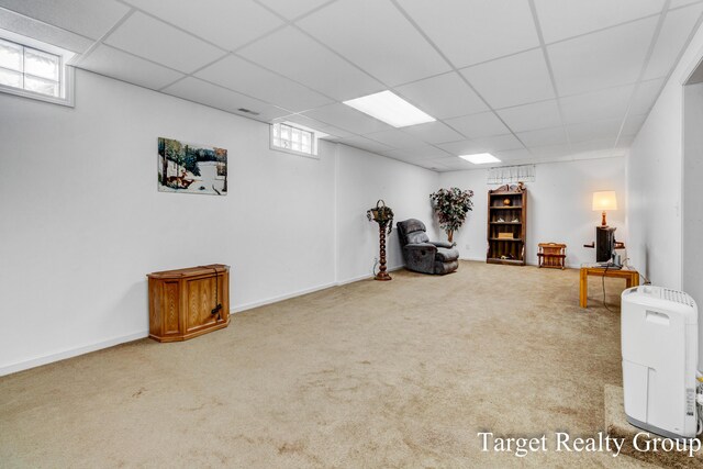 271 Rolling Greene Dr NW, Grand Rapids, MI 49534 - workout area with a paneled ceiling, carpet flooring, and plenty of natural light