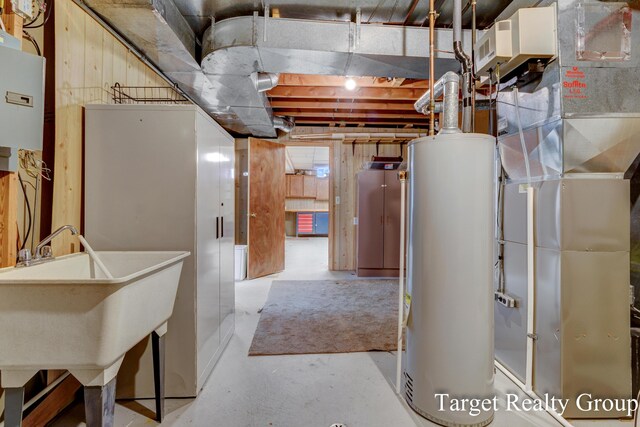271 Rolling Greene Dr NW, Grand Rapids, MI 49534 - unfinished basement with water heater and heating unit