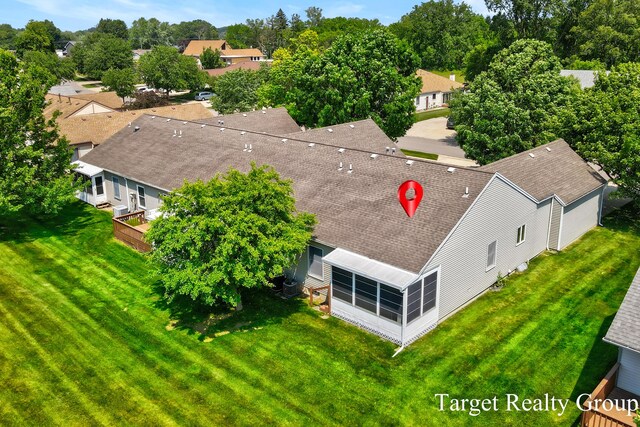 271 Rolling Greene Dr NW, Grand Rapids, MI 49534 - view of subject property featuring a tree filled landscape