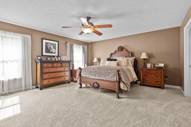 16069 Grazenview St, Schoolcraft, MI 49087 - carpeted bedroom featuring baseboards and a ceiling fan