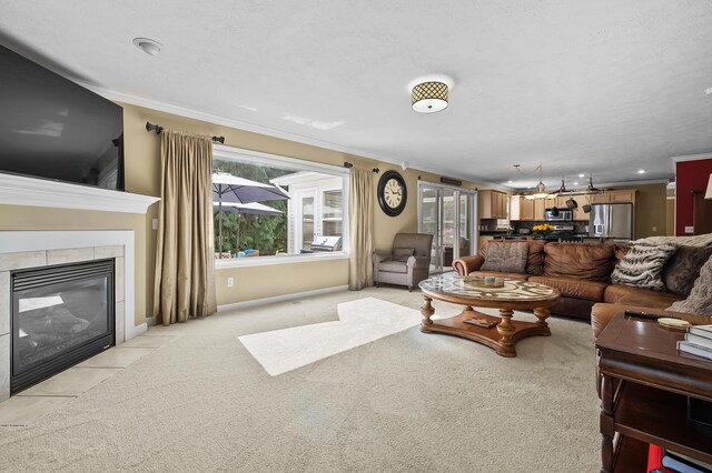 16069 Grazenview St, Schoolcraft, MI 49087 - living area with ornamental molding, a fireplace, light carpet, and light tile patterned floors