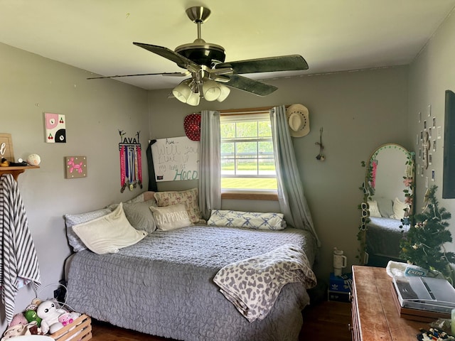 15030 N A Dr N, Marshall, MI 49068 - bedroom with wood finished floors and a ceiling fan