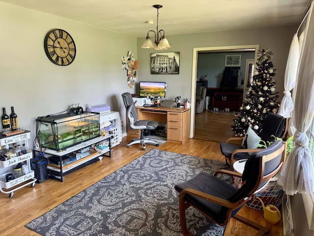 15030 N A Dr N, Marshall, MI 49068 - home office with wood finished floors and a chandelier