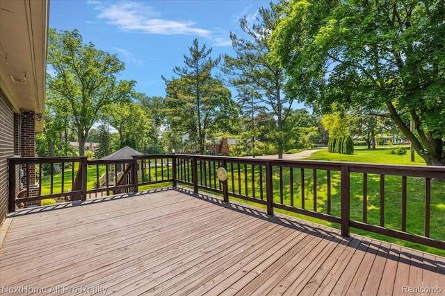 22219 Connemara Dr, Northville, MI 48167 - wooden terrace featuring a lawn