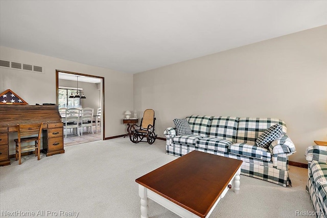 22219 Connemara Dr, Northville, MI 48167 - living area with carpet floors and baseboards