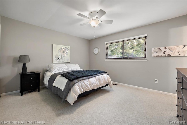 22219 Connemara Dr, Northville, MI 48167 - bedroom with light colored carpet and ceiling fan