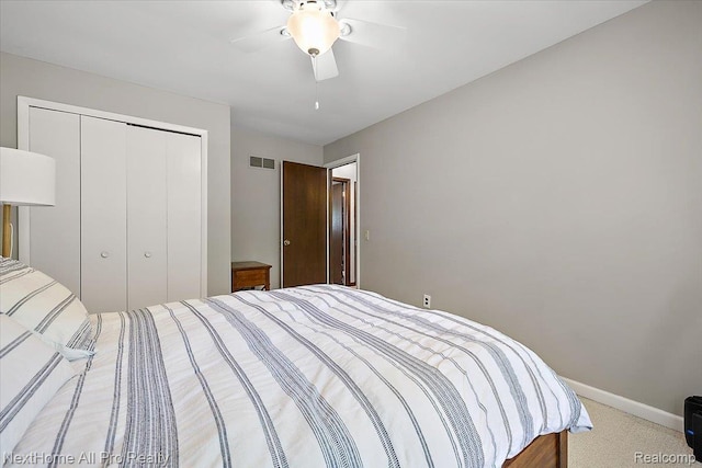 22219 Connemara Dr, Northville, MI 48167 - bedroom featuring a closet, light carpet, and a ceiling fan