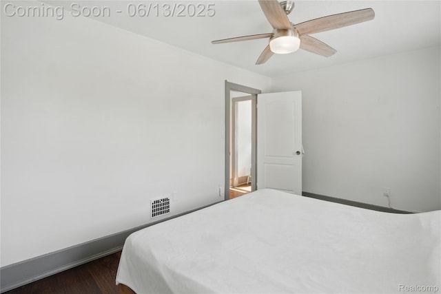 1390 W Blvd, Berkley, MI 48072 - bedroom featuring a ceiling fan and dark wood finished floors