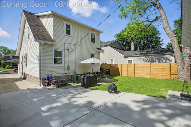 1390 W Blvd, Berkley, MI 48072 - back of property with a patio area and a shingled roof