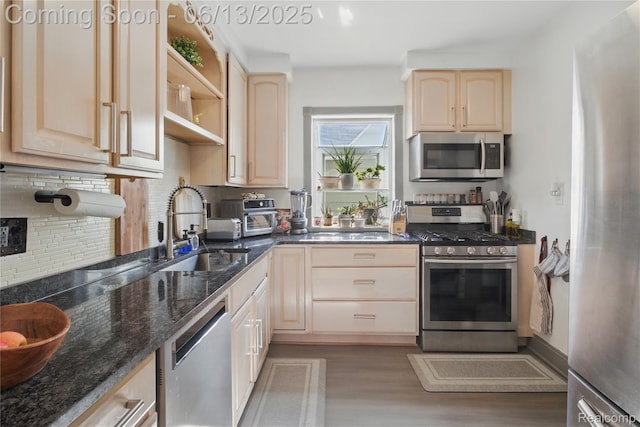 1390 W Blvd, Berkley, MI 48072 - kitchen with stainless steel appliances, light brown cabinetry, decorative backsplash, wood finished floors, and open shelves
