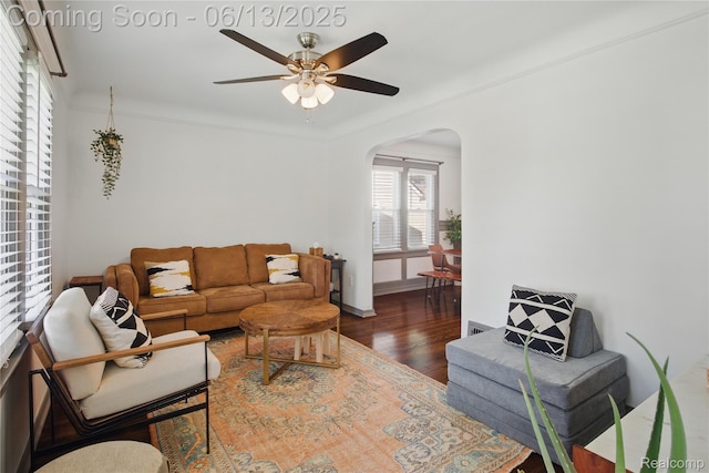 1390 W Blvd, Berkley, MI 48072 - living area featuring arched walkways, ceiling fan, and wood finished floors