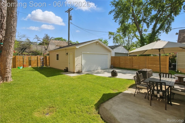 1390 W Blvd, Berkley, MI 48072 - fenced backyard featuring a detached garage, an outdoor structure, and a patio area