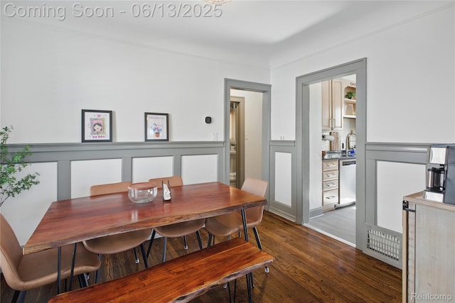 1390 W Blvd, Berkley, MI 48072 - dining area with dark wood-style flooring, a decorative wall, and a wainscoted wall