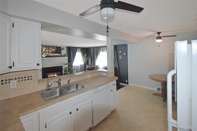 4466 Eastwood Dr, Swartz Creek, MI 48473 - kitchen featuring white appliances, a ceiling fan, white cabinetry, and tasteful backsplash