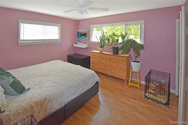 4466 Eastwood Dr, Swartz Creek, MI 48473 - bedroom with light wood-type flooring and ceiling fan