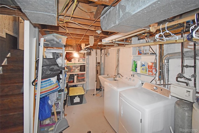 4466 Eastwood Dr, Swartz Creek, MI 48473 - unfinished basement featuring separate washer and dryer and a water softener system