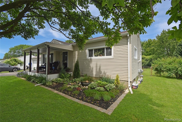 4466 Eastwood Dr, Swartz Creek, MI 48473 - view of property exterior with a porch