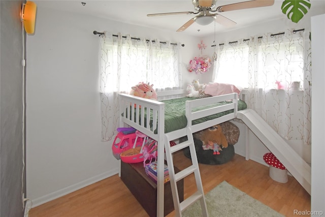 4466 Eastwood Dr, Swartz Creek, MI 48473 - bedroom featuring wood finished floors and ceiling fan