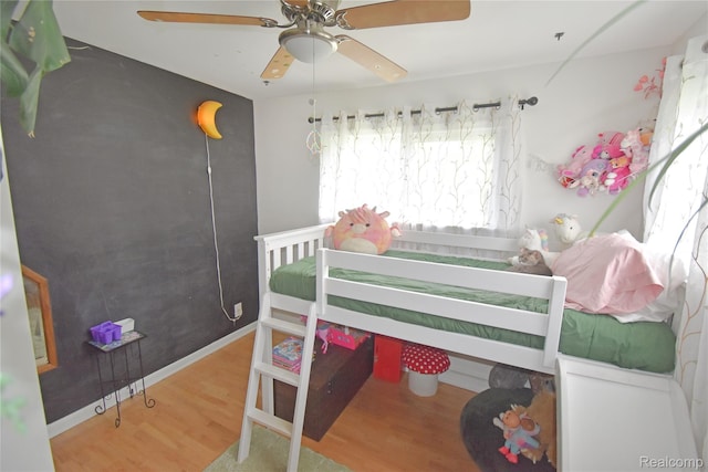 4466 Eastwood Dr, Swartz Creek, MI 48473 - bedroom featuring wood finished floors and ceiling fan