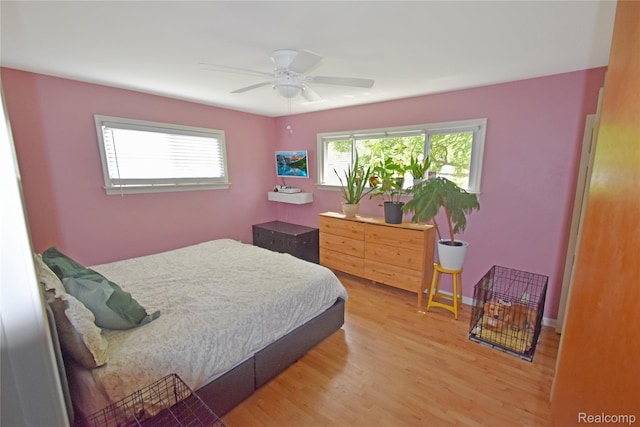 4466 Eastwood Dr, Swartz Creek, MI 48473 - bedroom with wood finished floors and a ceiling fan
