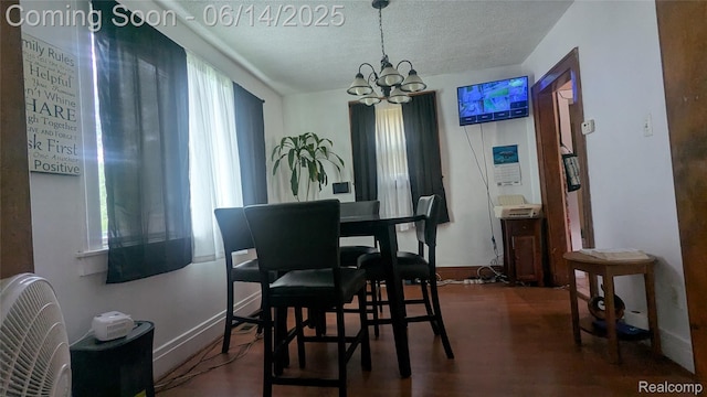100 Oliver St, Pontiac, MI 48342 - dining room with a chandelier, a textured ceiling, and wood finished floors