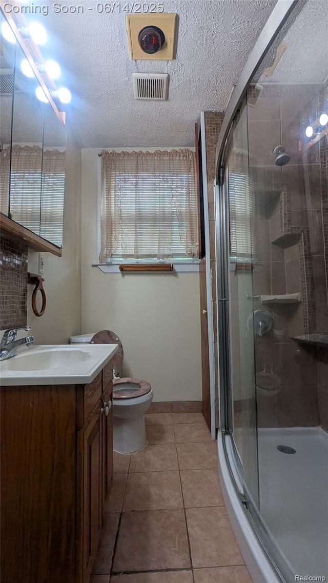 100 Oliver St, Pontiac, MI 48342 - full bathroom with a shower stall, vanity, tile patterned floors, and a textured ceiling