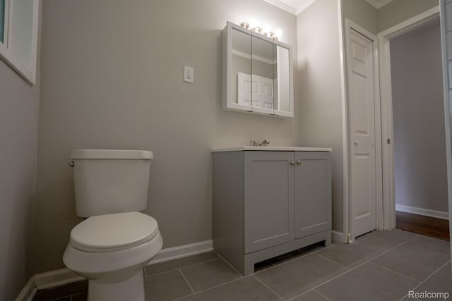 32431 Halmich Dr, Warren, MI 48092 - half bath featuring vanity, tile patterned floors, and ornamental molding