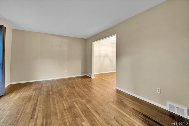 27416 Audrey Ave, Macomb, MI 48092 - unfurnished room with wood-type flooring and baseboards