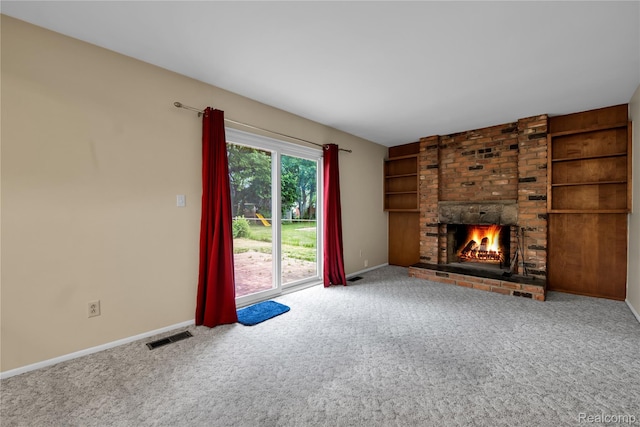 27416 Audrey Ave, Macomb, MI 48092 - unfurnished living room featuring carpet floors, a brick fireplace, and built in features