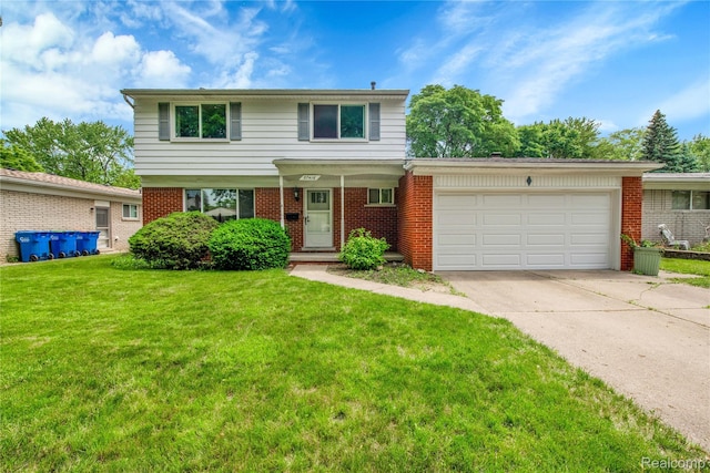 27416 Audrey Ave, Macomb, MI 48092 - view of front of house featuring a garage, driveway, a front lawn, and brick siding