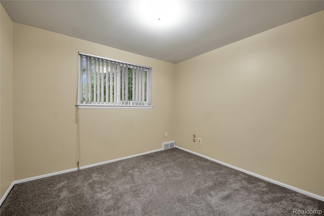27416 Audrey Ave, Macomb, MI 48092 - spare room with baseboards and dark carpet