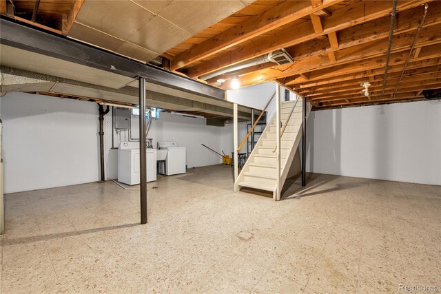 27416 Audrey Ave, Macomb, MI 48092 - basement featuring washing machine and clothes dryer, stairway, tile patterned floors, and electric panel