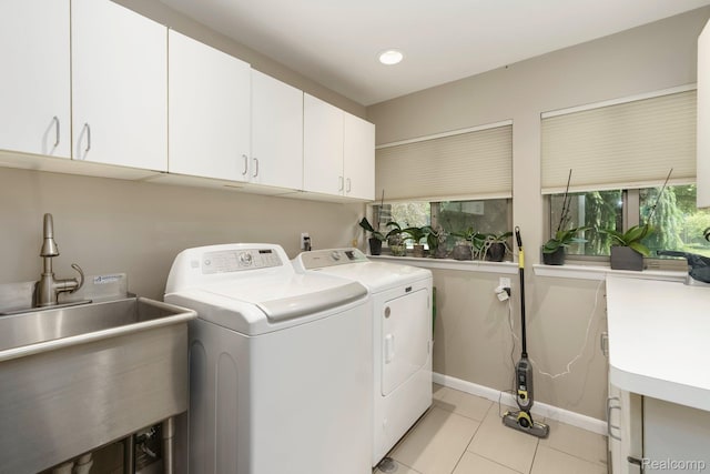 5156 Chestershire Ct, West Bloomfield, MI 48322 - laundry area with cabinet space, independent washer and dryer, light tile patterned floors, and recessed lighting