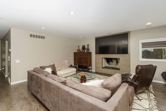5156 Chestershire Ct, West Bloomfield, MI 48322 - living area with wood finished floors, recessed lighting, and a fireplace